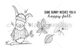 Red rubber stamp sheet with a bunny in a knit hat, scarf and striped sweater among falling leaves, three separate leaf stamps, and 'some bunny wishes you a hoppy fall'.