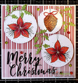 Card with poinsettia and pinecone ornaments over red stripes and 'Merry Christmas.'
