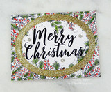 Card with a holly-and-berry border framing 'Merry Christmas.'