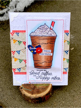 Patterned card with the coffee cup and the 'Good coffee, Happy vibes' banner, photographed on snow.