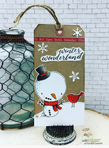 Kraft tag with the stitched snowman in a red top hat and striped scarf, a little red bird at his feet and white snowflakes, topped with 'winter wonderland' on a die cut banner.
