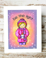 Card with the girl in a hot pink coat glowing against a snowy purple and pink background with be the light at the top.