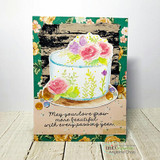 Card with the barn wall behind a floral cake: 'May your love grow more beautiful with every passing year.'