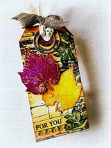 Tag with the barn wall behind a metallic autumn leaf: 'For you.'