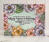Card with the flower border in soft purples and golds around 'May the God of hope fill you with all joy and peace in believing.'