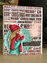 Card with the girl in red over 'Merry Christmas' repeat text on a teal die-cut.