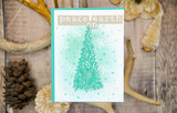 A soft teal-stamped pine tree with snow dots on a white card, captioned "Peace on earth."