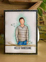 Angie Blom's Brian AngieGuy in a striped sweater with 'Hello handsome' and 'Thank you for being you,' a red rubber stamp shown on a card.