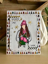 Card with the girl in a pink hat holding a poinsettia, 'believe,' 'joy,' 'love.'