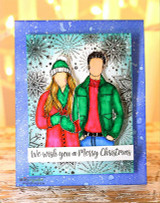 Card with a couple in winter coats on a snowflake background, 'We wish you a Merry Christmas.'