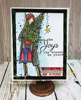 Black-framed card with Ember Girl on a white panel, 'May the joys of the season be yours' and 'no peeking' tag.