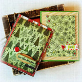 Two cards with the tree pattern in green and red tones with sentiment tags.