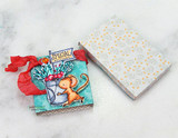 A sketchy-style mouse with a Special Delivery flag and a bucket of blooms stamped in red rubber and colored on a handmade card reading "Tomorrow is a new day."