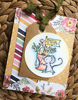 A sketchy-style mouse with a Special Delivery flag and a bucket of blooms stamped in red rubber and colored on a handmade card reading "Special delivery."
