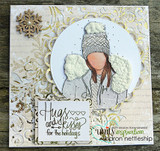 Card of the winter girl on a soft circle with 'Hugs and kisses for the holidays.'