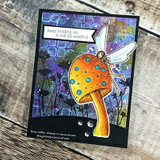 Fairy on an orange spotted mushroom against a purple and blue galaxy background on a black card, stamped 'keep holding on, it will be worth it'.