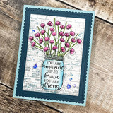 Navy scalloped card with pink flowers in the mason jar over a brick-texture background and the amazing-brave-strong sentiment