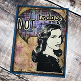 The retro woman on a grungy mixed-media card with a large speech bubble.