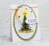 Card with the colored Christmas tree with a glowing star on a green polka-dot oval, 'Merry Christmas.'