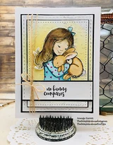 Layered black-and-white card with the girl in a mint dress holding her bunnies, tied with twine and stamped 'no bunny compares.'