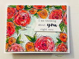 Card with the rose border colored in warm reds and oranges around 'I am thinking about you right now.'