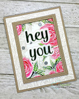 Kraft-framed card with the pink-and-green rose border around a 'hey you' sentiment.