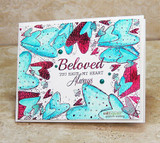 Sample card with the heart border colored turquoise and magenta around an open white center, finished with a script sentiment and small enamel dots.