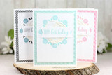 Trio of pastel mini cards with small stamped wreaths and happy birthday centers