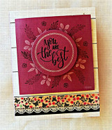 Deep red card with tone-on-tone wreath and gold you are the best center
