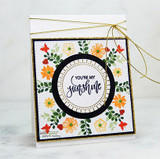 Autumn orange and green wreath around you're my sunshine in a black circle frame