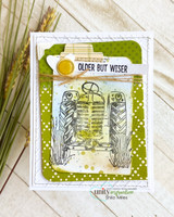 Blue-green vintage tractor, 'OLDER BUT WISER,' on green polka-dot papers.