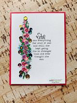 Card with the floral shell strip colored in bright pinks and yellows with sequins, beside the sentiment 'She saw everything for what it was and still she kept going.'
