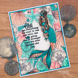 Coral and teal shell-pattern card with the mermaid in the center, over 'She saw everything for what it was and still she kept going.'