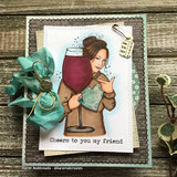 Woman with a glass of red wine, 'Cheers to you my friend,' with a teal bow on a gray card.