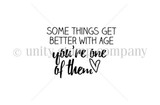 Itty bitty red rubber sentiment stamp reading 'Some things get better with age, you're one of them,' with a small heart.