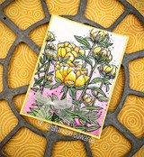 Card with the peony spray colored in golden yellow over a pink panel on bold patterned paper.
