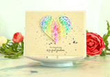 Cream card with the butterfly heart stamped in rainbow ink and popped up, sentiment "To choose joy, is to find freedom." below it.