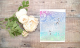 Card with the rose background in a soft pastel blend, 'you.'