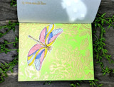 Card with the rose background embossed on bright green.