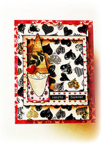 Black and white hearts background on a red-edged card with a gnome holding a heart and a hearts forever label.