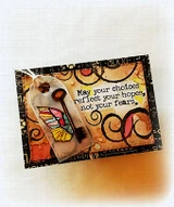 Warm orange and black card with a tag holding a winged key and a stamped sentiment reading May your choices reflect your hopes, not your fears.