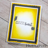 Yellow card with cauldron accents, 'keep a little magic in your heart'