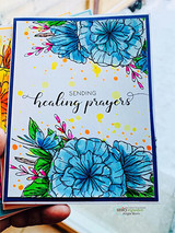 Card with blue hydrangea-style flowers in the corners and 'Sending healing prayers.'