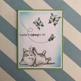 Sketchy-style kitten and butterfly red rubber stamps by Lisa Glanz reading 'thanks for believing in me,' shown on a handmade encouragement card.