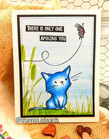 Sketchy-style kitten and butterfly red rubber stamps by Lisa Glanz reading 'thanks for believing in me,' shown on a handmade encouragement card.