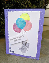 Card with the kitty on glittered balloons over purple, 'hope your birthday is purr-fect.'