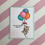 Card with the kitty on jewel-toned balloons over pink dots, 'hope your birthday is purr-fect.'