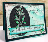 A leaf sprig on a black oval over a teal-washed card with 'be patient with yourself.'