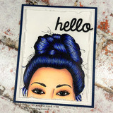 Card with the messy-bun girl colored with deep blue hair on a white panel with a navy frame and a bold 'hello'