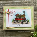 Card with the tulip wagon on green dot paper tied with red twine and a heart, 'Sending you joy.'
